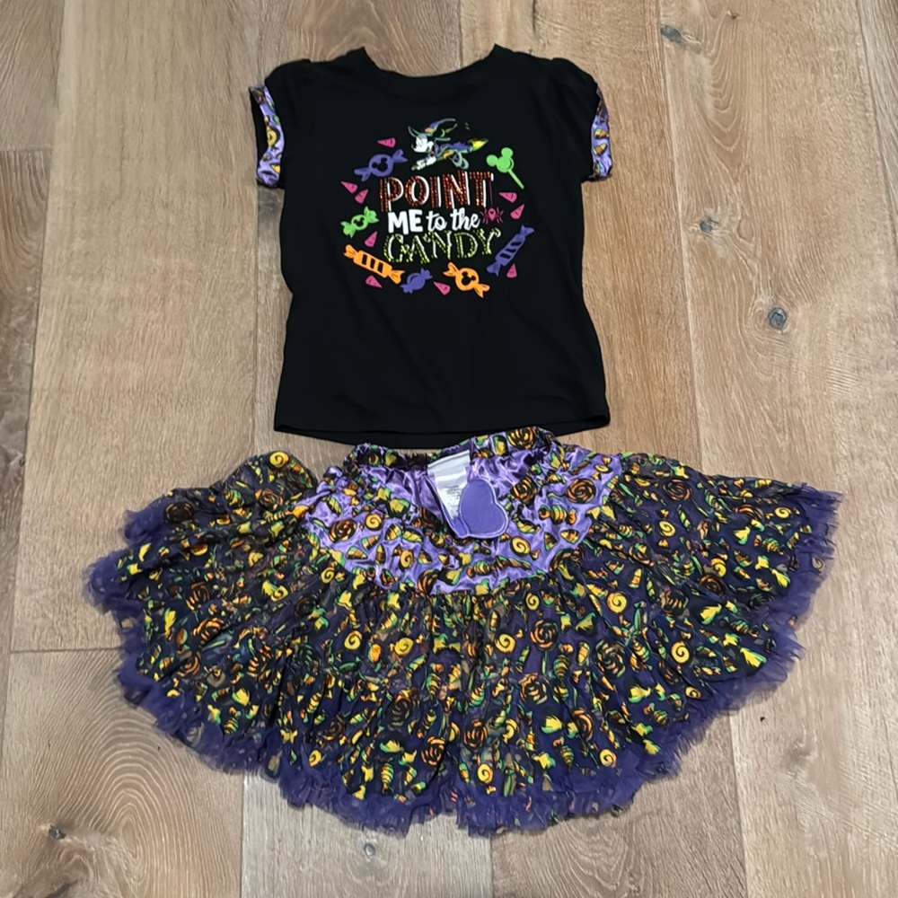 Like new from Disneyland Halloween tee with satin trim on arm.